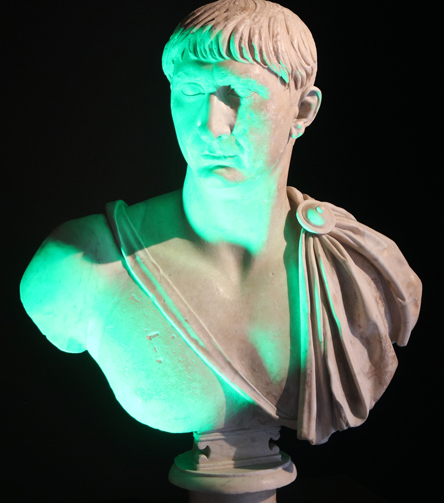 Fig. 3. A raking green light illuminates one portrait of Trajan.